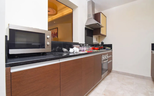 OYO Home 161 1BHK Taj Grandeur Palm