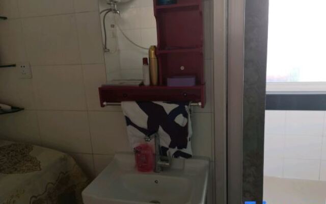 Tiantiansheng Warm Theme Apartment