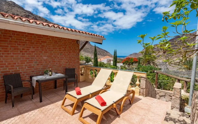 Casa de vacaciones con piscina compartida en Mogán II