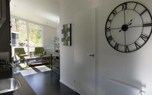 Modern Chalet With A Barbecue At The Forest