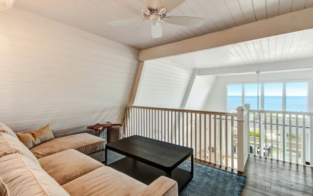 Roomy Chalet-Style Beachfront Condo with Private Beach Access by RedAwning
