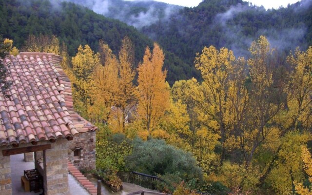 Masía La Posada del río Carbo