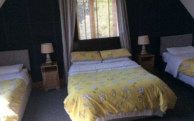 Coach House Suites