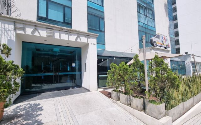 Hábitat Suites Hotel
