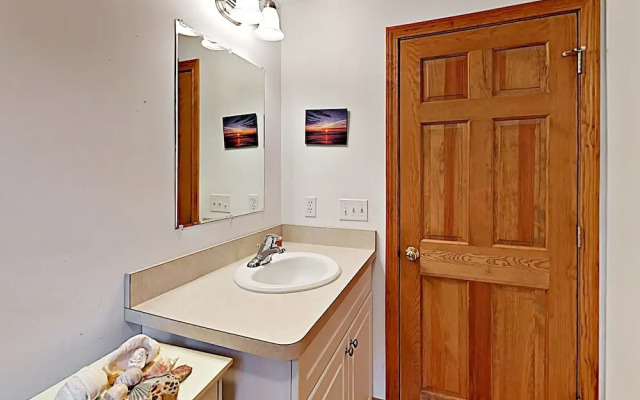 Woodsy Cape Cod Home by RedAwning