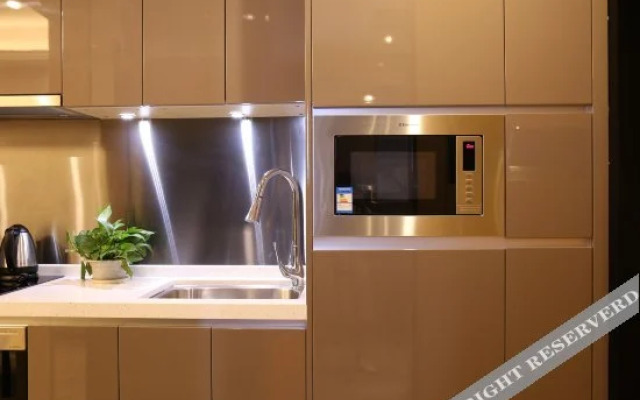 Yicheng Apartment Hotel (Taizhou Wanda Plaza)