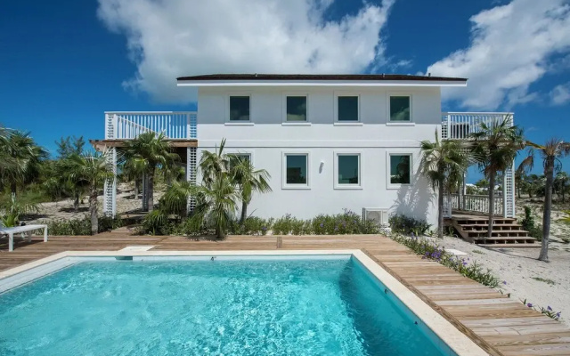 Tropical Haven: Luxurious Home Steps From Beach