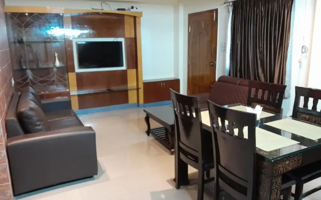 the Nisarga Grand   boarding & lodging