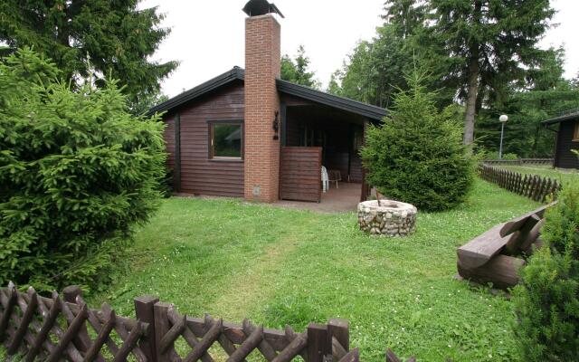 Wooden bungalow with oven, in Oberharz near a lake