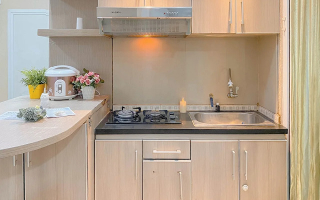 Tranquil And Homey 2Br At Apartment Green Pramuka City