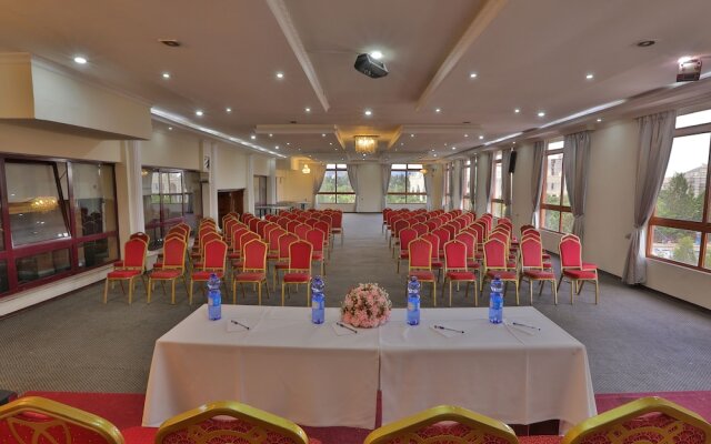 Kenenisa.. Oasis International Hotel