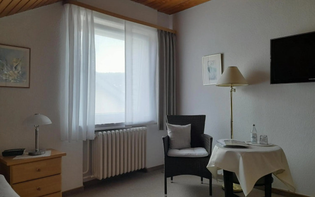 Ferienwohnung und Gästezimmer Iburgblick