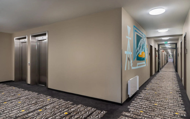 Отель Holiday Inn - the niu, Timber Esslingen, an IHG Hotel