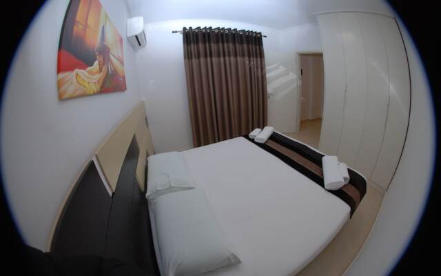 White Deluxe Apartments