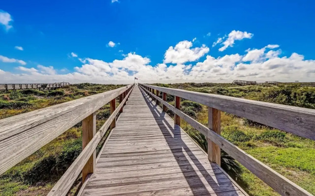 Newly Remodeled Oceanfront Condo with Salt Water Pool and Private Walkway to Beach by RedAwning
