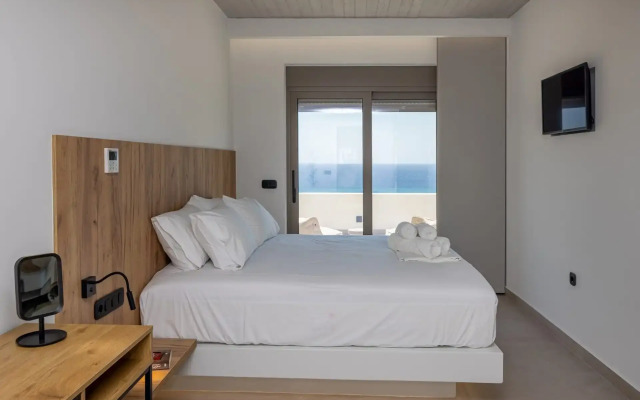 Monogram Travel Tinos