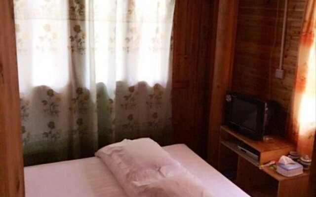 Longsheng Zhaihualou Inn