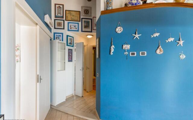 Blue house on the sea