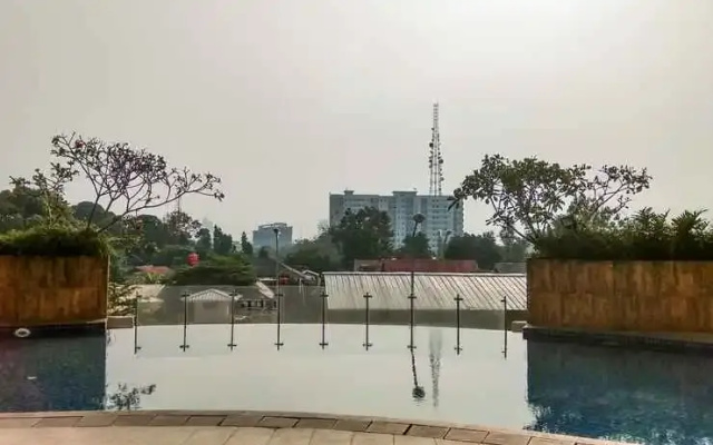 Bright and Clean Studio Apartment Serpong Greenview By Travelio
