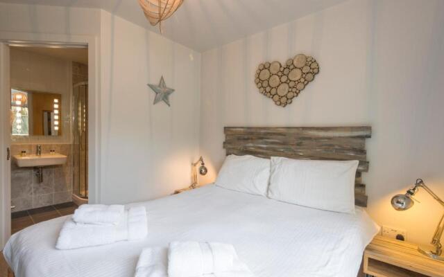 The Beach House & Porth Sands Apartments