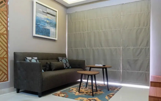 Comfortable 2BR @The Oasis Apartment By Travelio