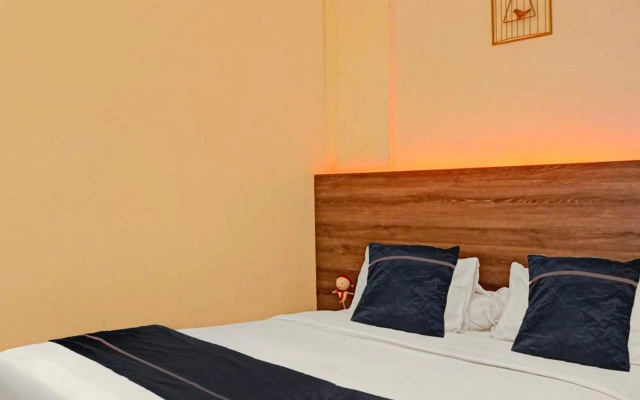 Hotel O near Ringroad City Walk XXI formerly Mitrotel Medan – Guest Rooms – Medan