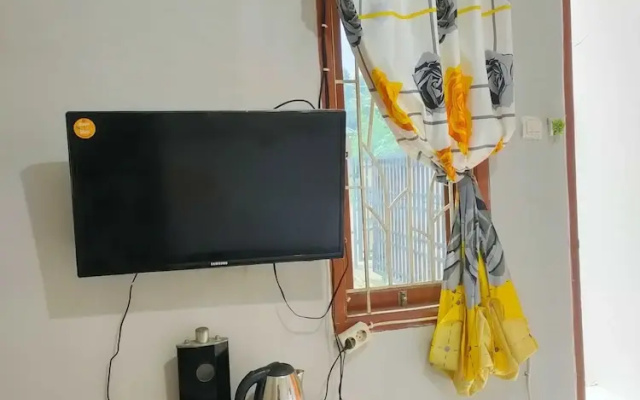 EXPRESS O 91277 Atiq Homestay Syariah