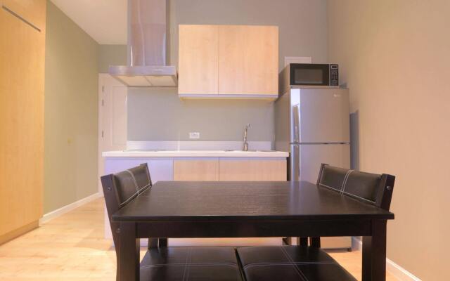 SIGLO SUITES @ The Gramercy Residences