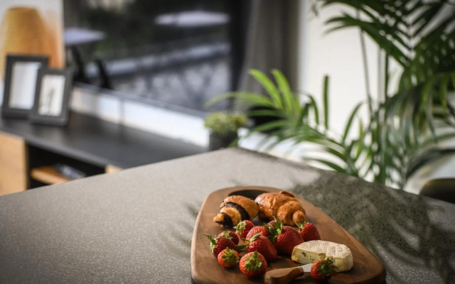 Stylish 2BR Apartment with Balcony and Urban View