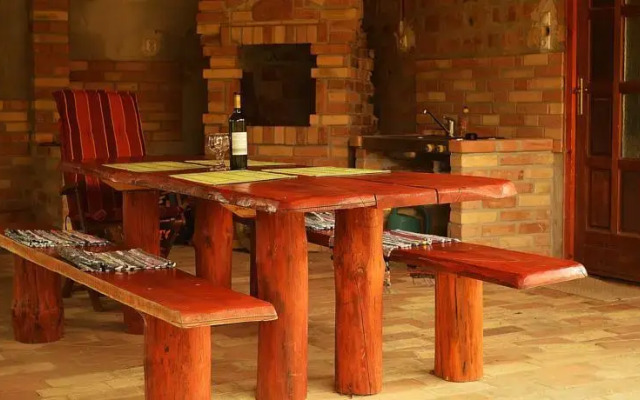 Almaliget Apartmanház