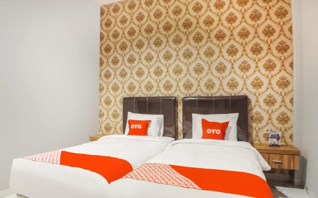 Super Oyo Capital O Papakoel Hotel & Cafe