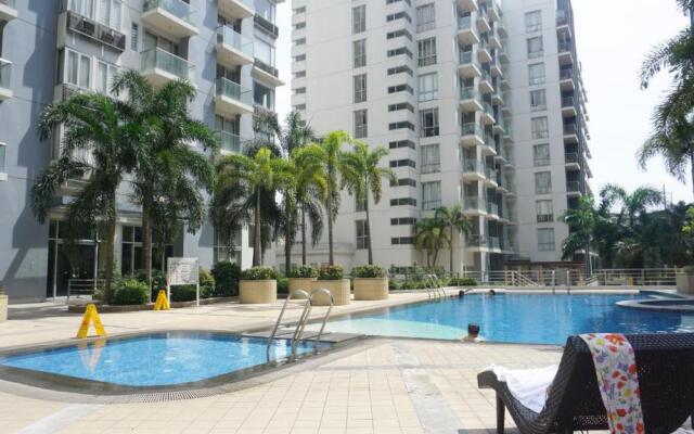 Palm Tree Condos across NAIA3 by Beth
