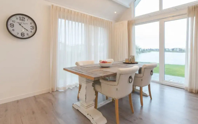 Stylish Holiday Home with Fireplace near Oosterschelde