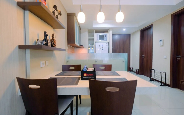 Modern 2BR Apartment at Kemang Village By Travelio