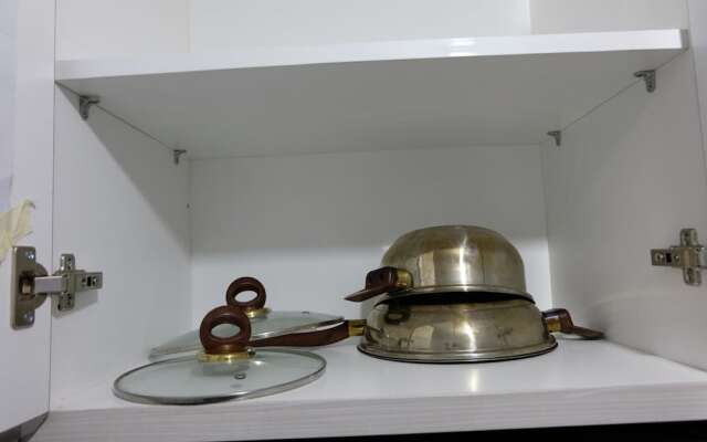 Simple Studio Room at Poris 88 Apartment