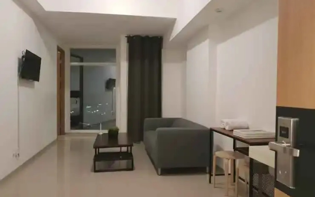Alpine Room at TreePark City Apartemen