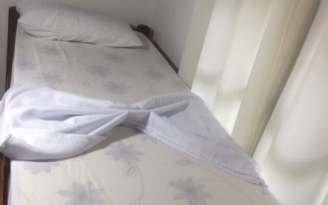 Em Casa Hostel
