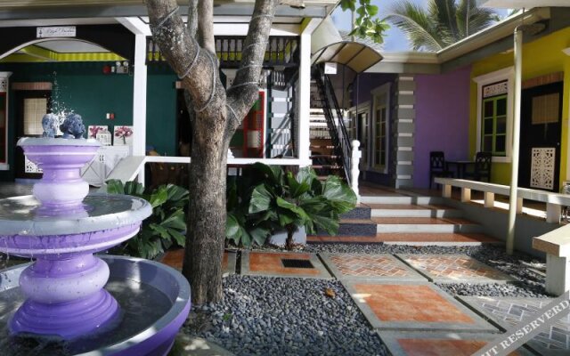 Purple Fountain Courtyard Inn