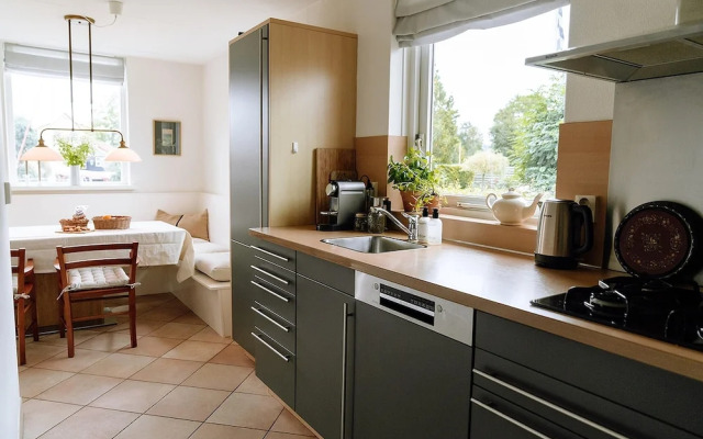 Nice Holiday Home on the Water in Grou