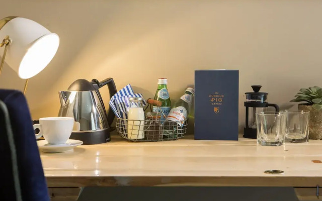 The Curious Pig in the Parlour