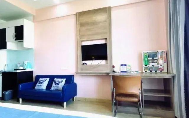 Home Huayi Hotel (Pingdu Renmin Road Branch