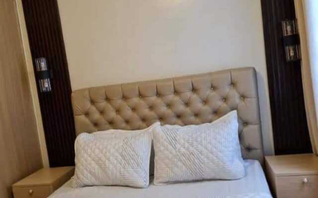 OYO 936 Yumis Condotel Trees Residences