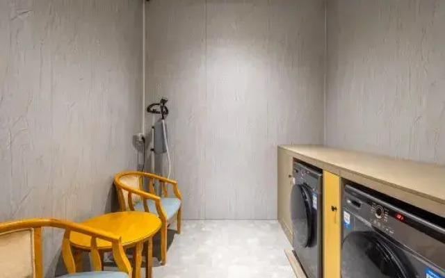 Xiangqing Qi'an Smart Hotel (Tunchang Central Commercial Plaza)
