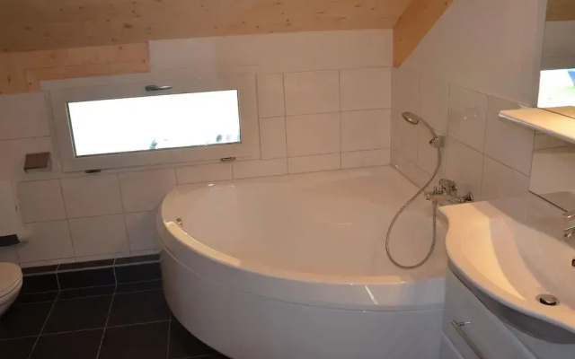 Spacious Chalet With IR Sauna and Whirlpool