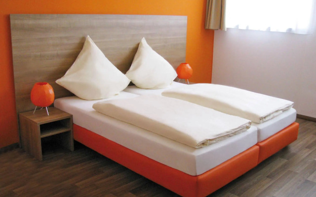 Orange Hotel und Apartments