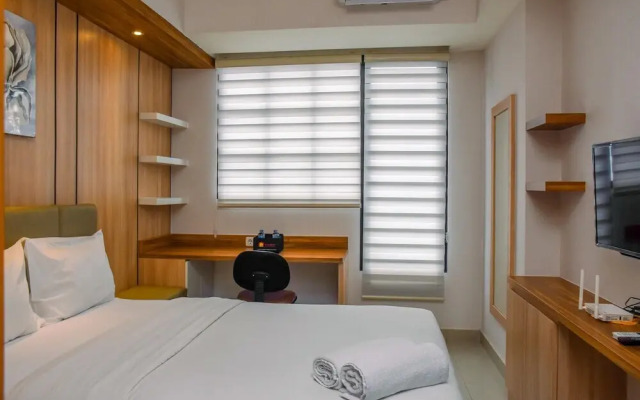 Nice And Cozy Studio At Evenciio Apartment