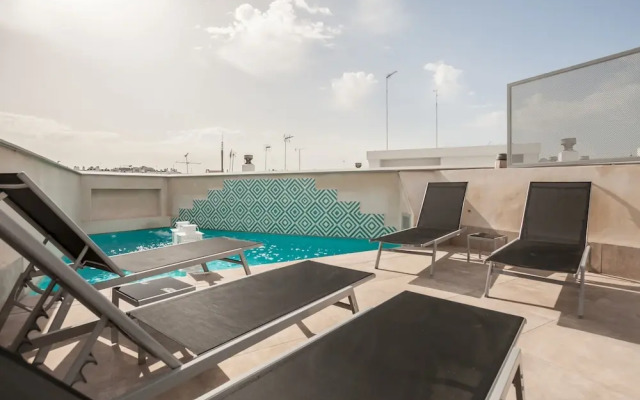 Sevilla Alquila Suites Jardines de Murillo con piscina climatizada