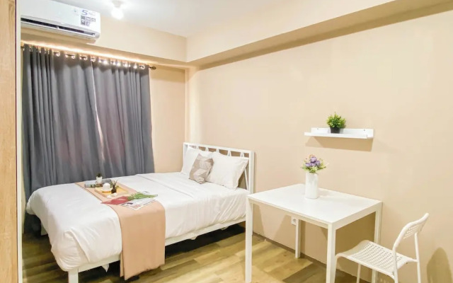 Soft Minimalist Studio Room At Meikarta Apartment