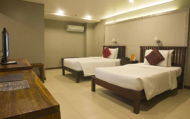 OYO 103 Artina Suites Hotel