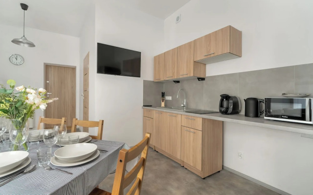Poznan Stylish Grey Apartment by Renters